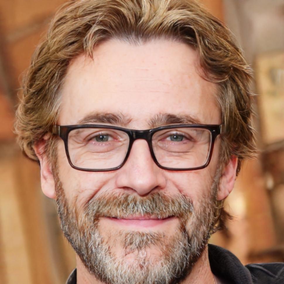 Retrato profesional de instructor culinario con experiencia en técnicas de cocina casera